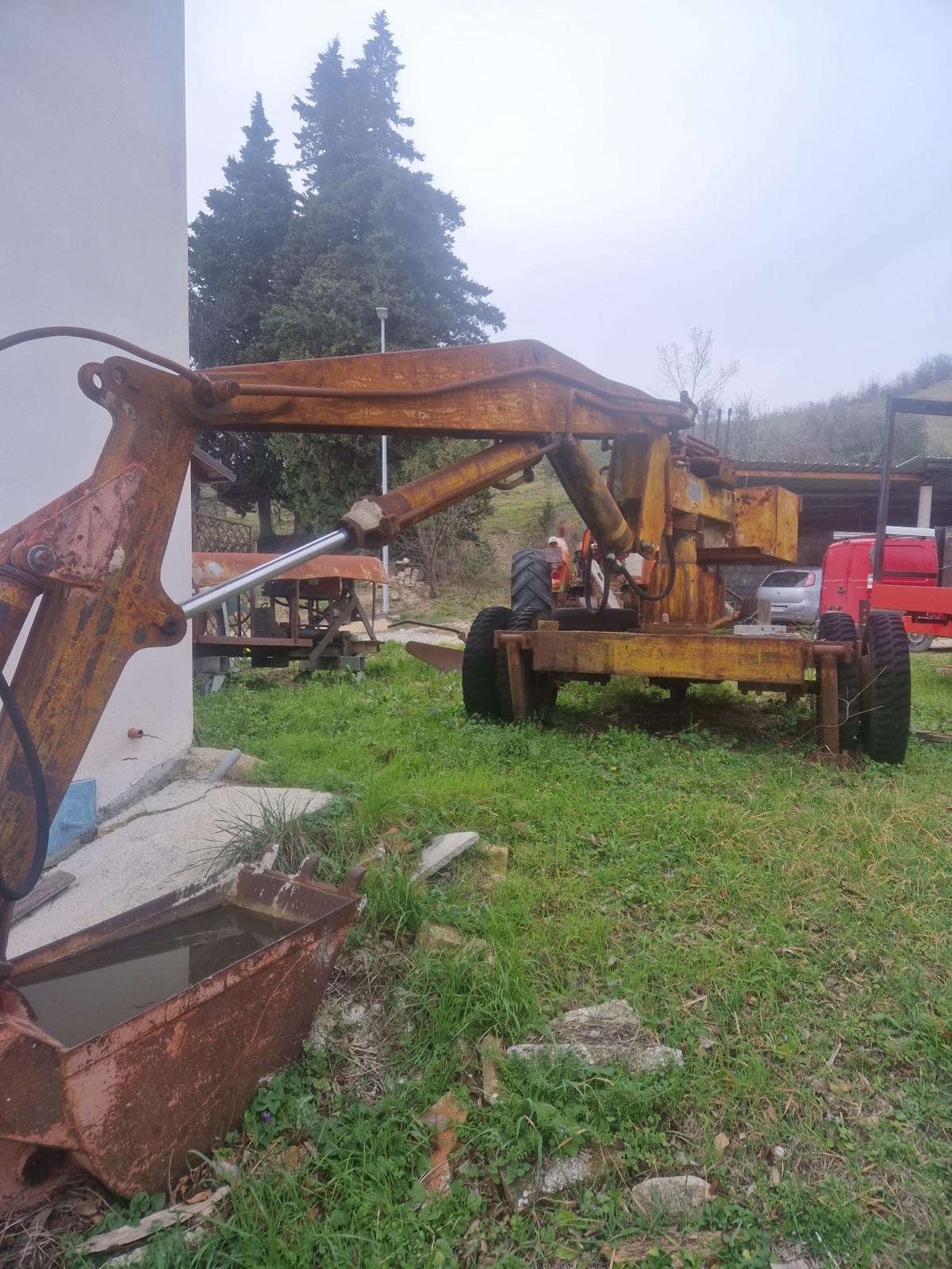 Carica Letame / benna escavatore